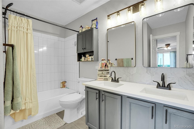 10521 Taylor Ave, Firestone, CO 80504 - full bathroom featuring shower / bath combo, tile patterned floors, decorative backsplash, double vanity, and ceiling fan