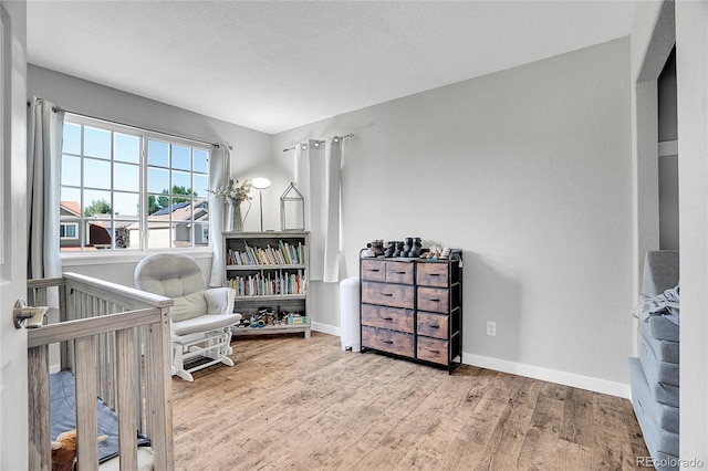 10521 Taylor Ave, Firestone, CO 80504 - bedroom with wood finished floors and baseboards