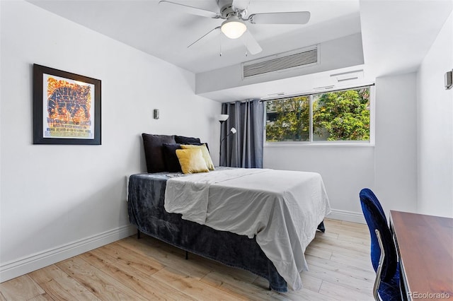 1121 Albion St Unit 210, Denver, CO 80220 - bedroom featuring baseboards, light wood-type flooring, and ceiling fan