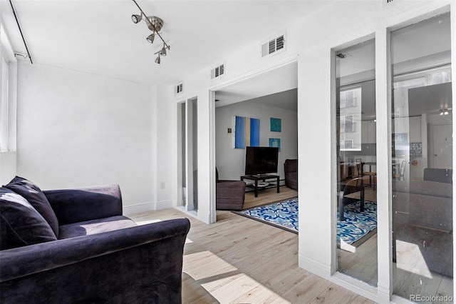 1121 Albion St Unit 210, Denver, CO 80220 - living room with wood finished floors