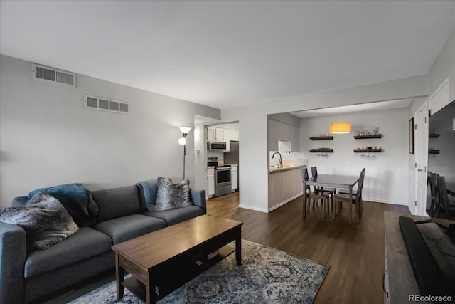 519 Wright St Unit 108, Lakewood, CO 80228 - living area featuring dark wood-style floors