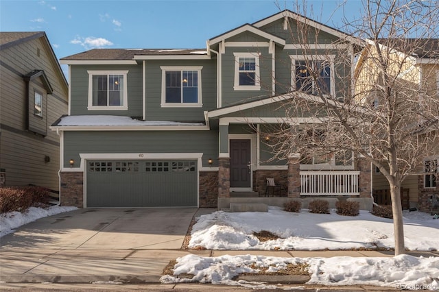 craftsman-style home featuring a garage and a porch