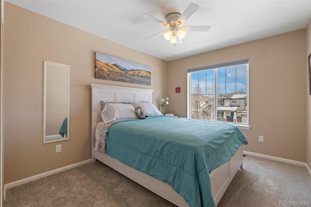 bedroom with light carpet and ceiling fan