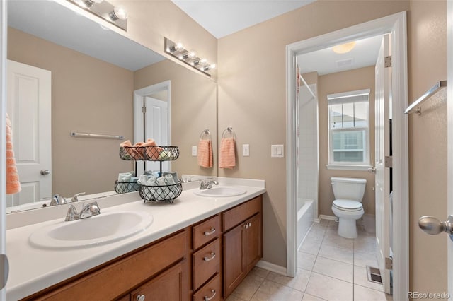 full bathroom featuring tile patterned flooring, vanity, bathtub / shower combination, and toilet