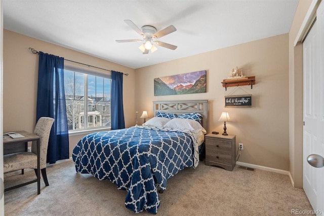 bedroom featuring ceiling fan, carpet floors, and a closet