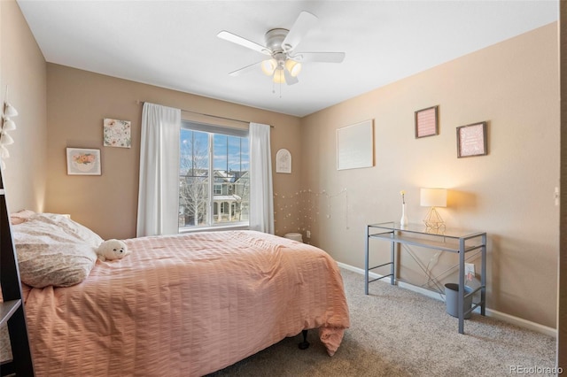 bedroom with ceiling fan and light colored carpet