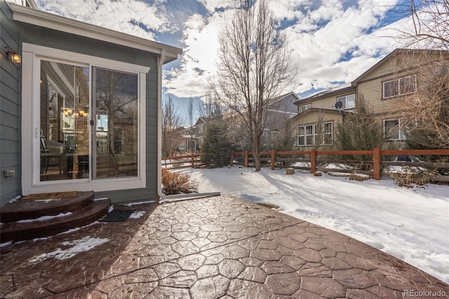 view of snow covered patio