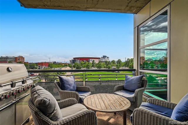 1401 Wewatta St Unit 308, Denver, CO 80202 - balcony featuring a city view and area for grilling