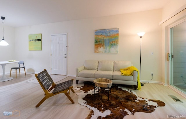 2428 W 82nd Pl Unit 3G, Westminster, CO 80031 - living area with wood finished floors and baseboards