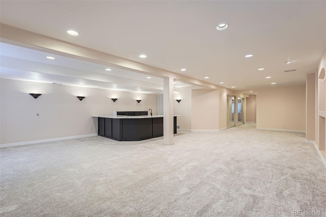 22019 E Arbor Dr, Aurora, CO 80016 - unfurnished living room with light carpet, wet bar, and recessed lighting
