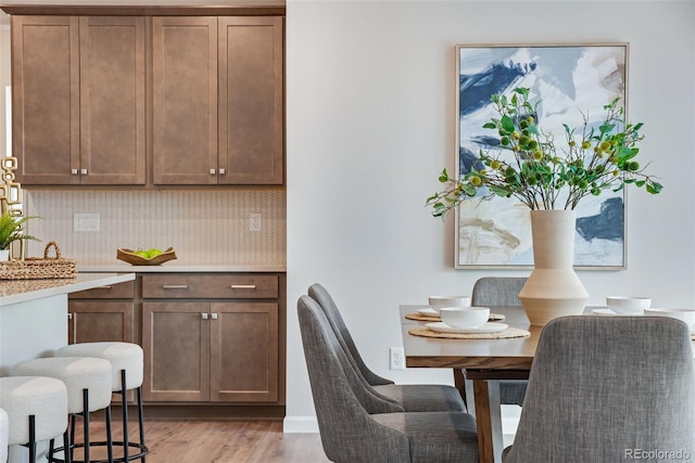 dining room featuring light wood-type flooring