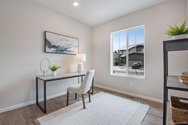 office area featuring hardwood / wood-style floors