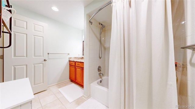 14833 Vine St, Thornton, CO 80602 - bathroom with tile patterned flooring, vanity, shower / tub combo, and baseboards