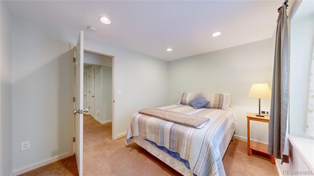 14833 Vine St, Thornton, CO 80602 - bedroom featuring light carpet, recessed lighting, and baseboards