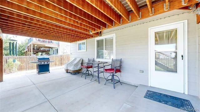 14833 Vine St, Thornton, CO 80602 - view of patio with fence and a grill