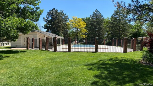 9005 E Lehigh Ave Unit 16, Denver, CO 80237 - view of yard with a community pool