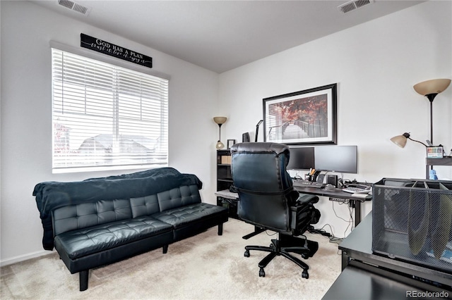 office area with carpet and visible vents