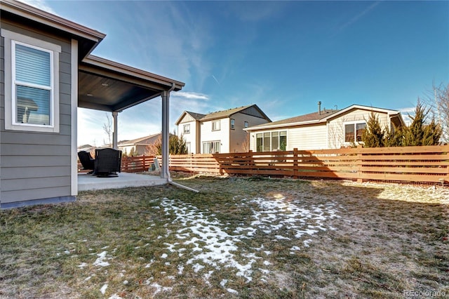 view of yard with a patio and fence