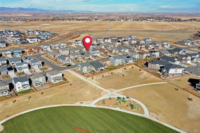 aerial view featuring a mountain view and a residential view