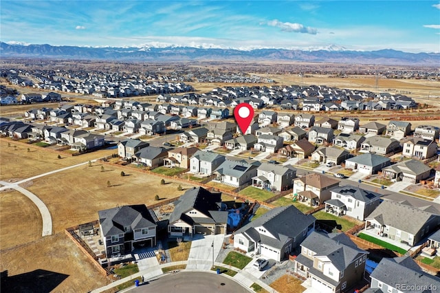 bird's eye view featuring a residential view and a mountain view