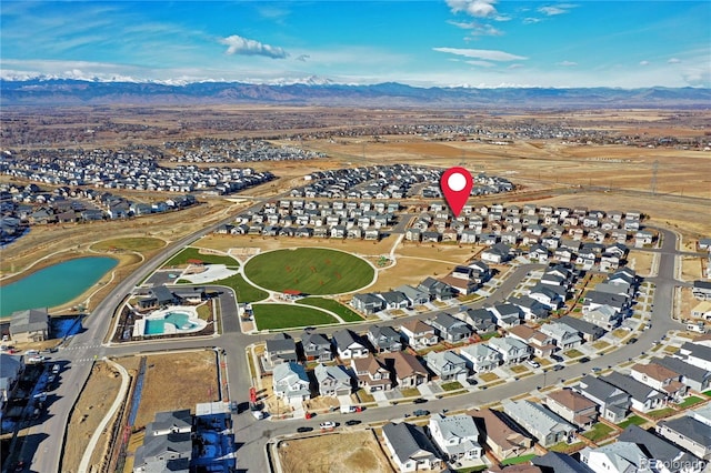 drone / aerial view with a mountain view and a residential view