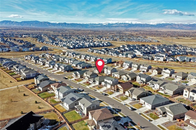 birds eye view of property featuring a residential view and a mountain view