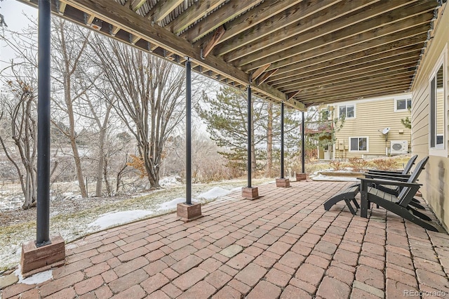 view of snow covered patio