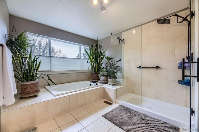 2522 W Dry Creek Ct, Littleton, CO 80120 - full bathroom featuring tiled shower, tile patterned floors, and a bath