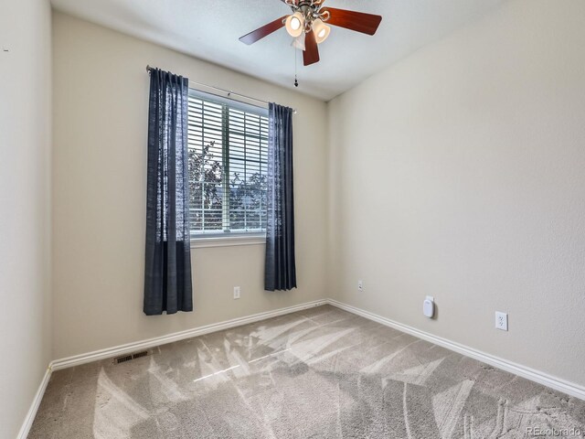 13385 Jasmine St, Thornton, CO 80602 - carpeted spare room featuring baseboards and a ceiling fan