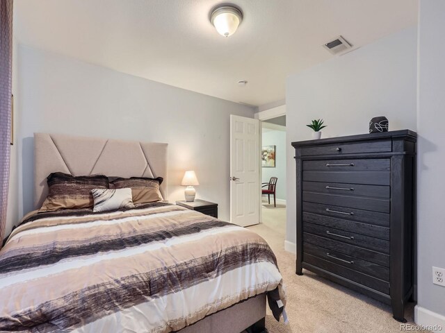 13385 Jasmine St, Thornton, CO 80602 - bedroom featuring light carpet and baseboards