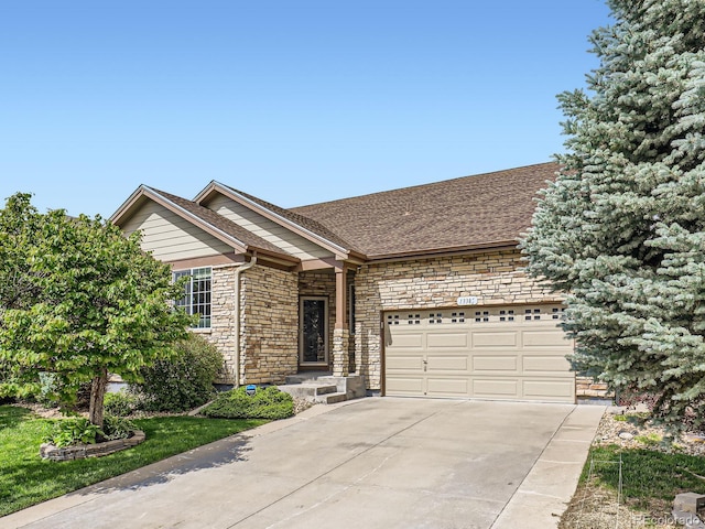 13385 Jasmine St, Thornton, CO 80602 - ranch-style home featuring driveway, stone siding, and a garage