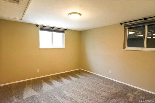 empty room featuring carpet flooring