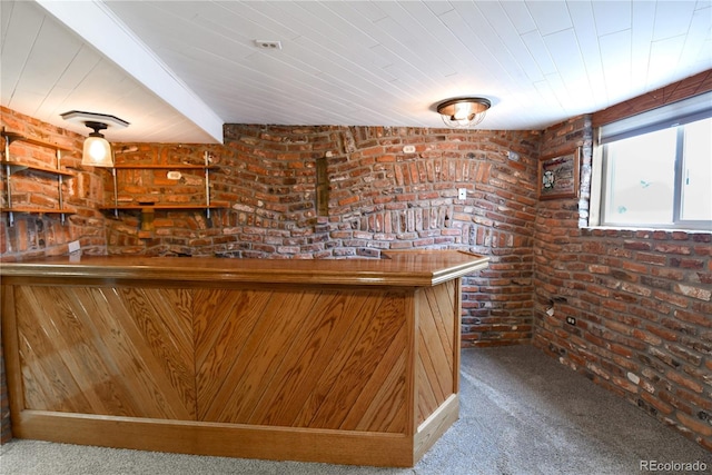 bar featuring beamed ceiling, brick wall, and carpet flooring