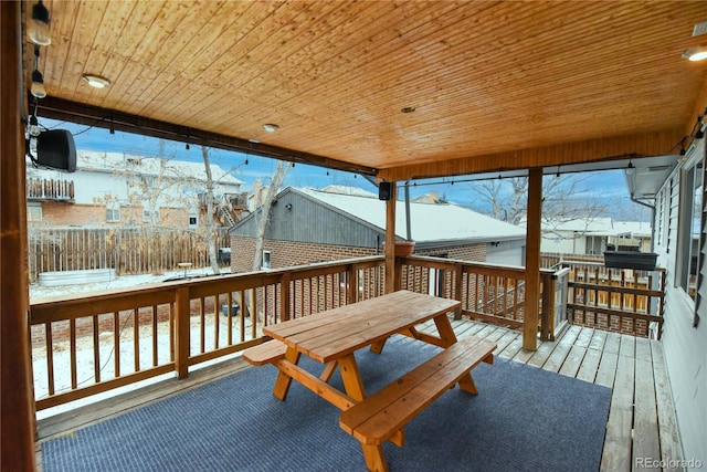 view of snow covered deck