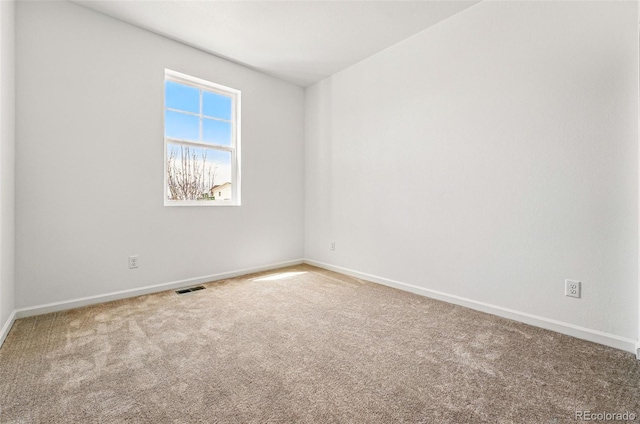 3401 N Denali St, Aurora, CO 80019 - carpeted spare room with baseboards