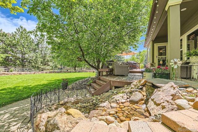 14118 Whitney Cir, Broomfield, CO 80023 - view of grassy yard featuring a patio area