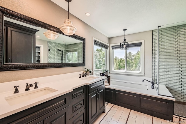 14118 Whitney Cir, Broomfield, CO 80023 - full bathroom featuring a garden tub, a shower stall, double vanity, and recessed lighting