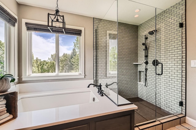 14118 Whitney Cir, Broomfield, CO 80023 - full bath featuring a garden tub, a stall shower, and healthy amount of natural light