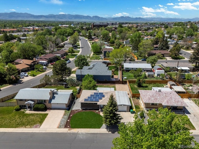 aerial perspective of suburban area featuring a mountainous background