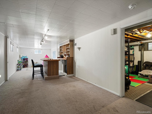 bar featuring carpet flooring and baseboards