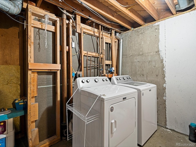 washroom featuring independent washer and dryer