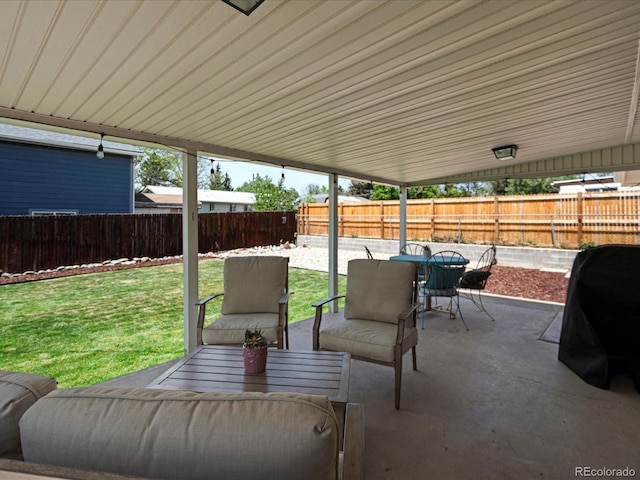view of patio featuring outdoor dining area