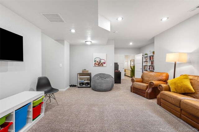 9567 Juniper Way, Arvada, CO 80007 - carpeted living room with recessed lighting and baseboards