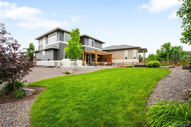 9567 Juniper Way, Arvada, CO 80007 - rear view of house with a patio