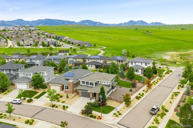 9567 Juniper Way, Arvada, CO 80007 - aerial view of residential area featuring a mountainous background