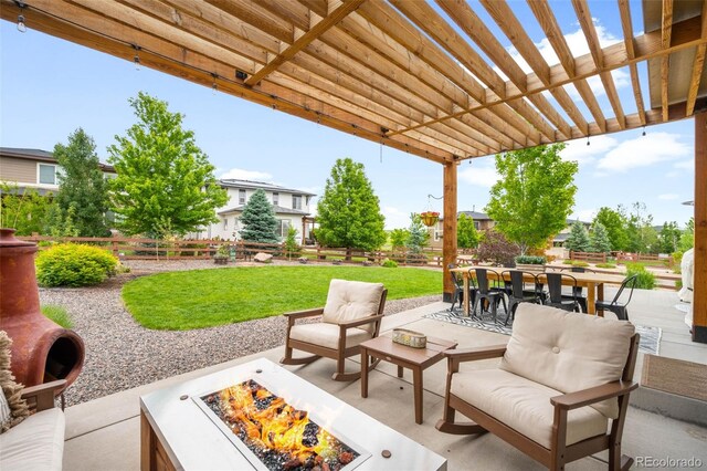 9567 Juniper Way, Arvada, CO 80007 - view of patio / terrace featuring an outdoor fire pit, outdoor dining area, and a pergola