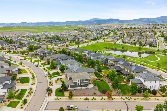 9567 Juniper Way, Arvada, CO 80007 - aerial view of residential area with a water and mountain view