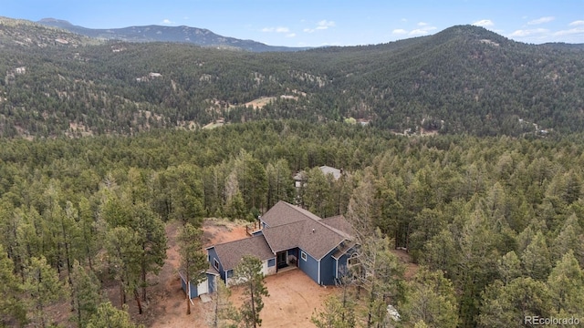 29004 Amerind Springs Trl, Pine, CO 80470 - mountain view with a forest