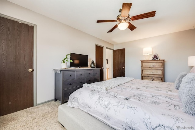 bedroom featuring ceiling fan and carpet floors