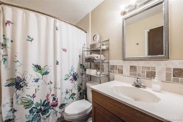 bathroom with walk in shower, vanity, toilet, and tile walls